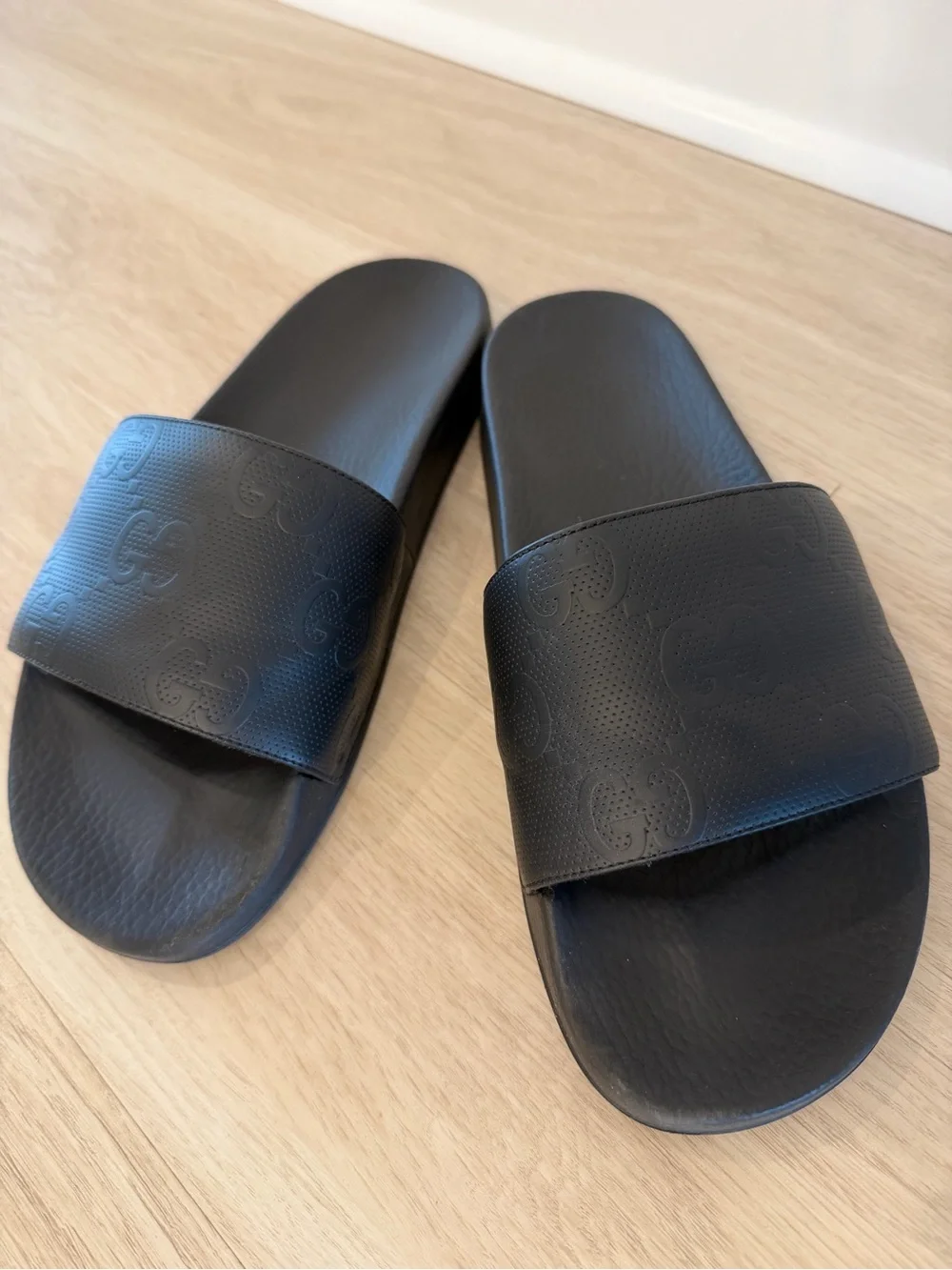 Men’s Gucci Black Embossed GG Slide Sandals
